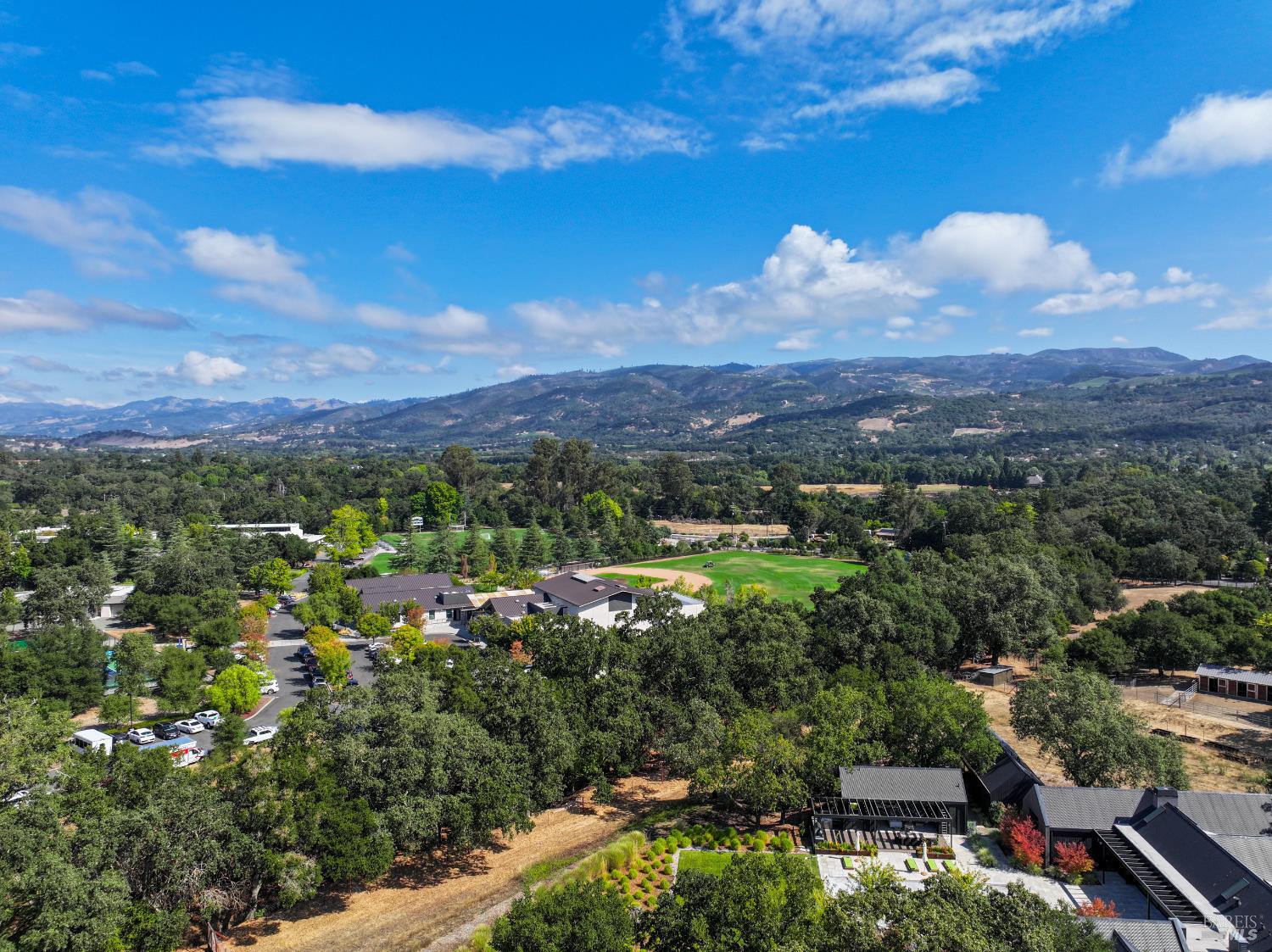 1219 Repetto Ranch Road Sonoma, CA 95476 - Photo 42 of 54 a view of a city with lush green forest