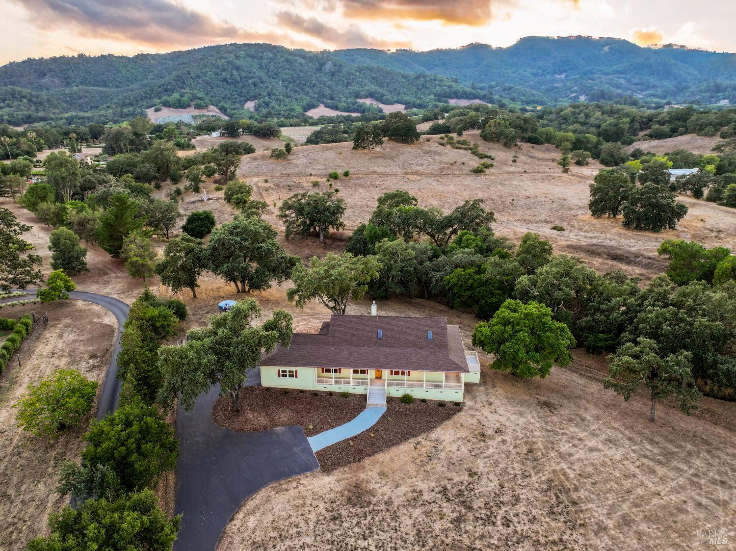 1219 Repetto Ranch Road Sonoma, CA 95476 - Photo 47 of 54 an aerial view of a house with mountain view