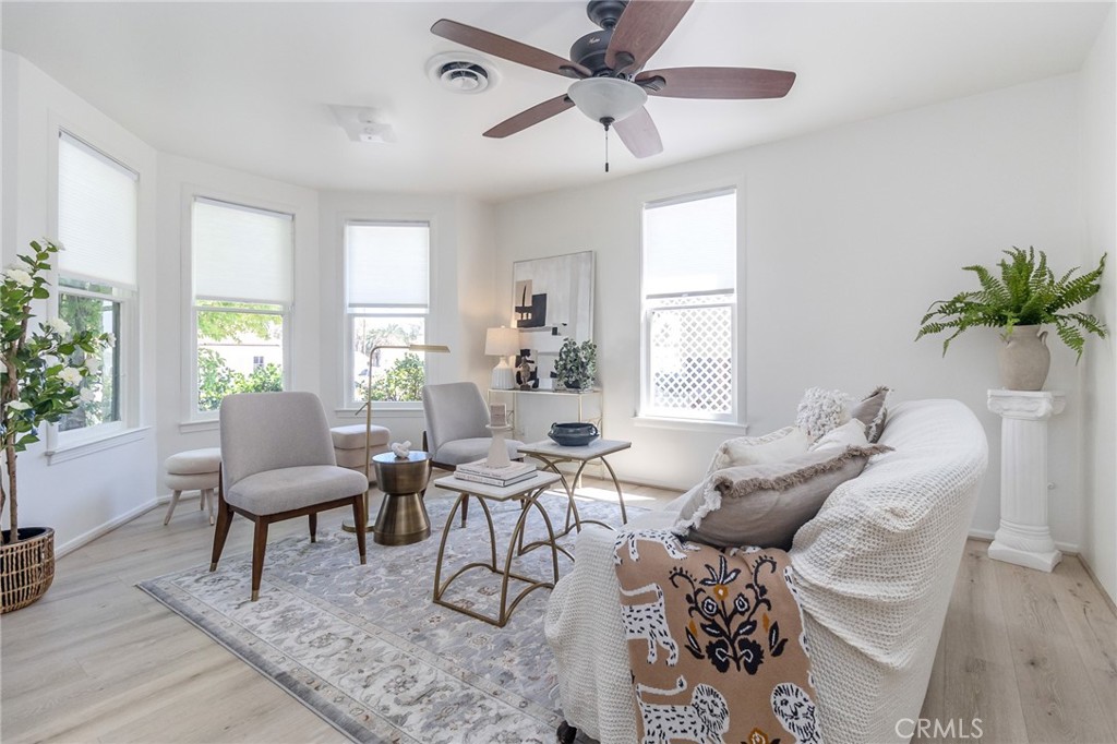411 Bazoobuth Street Needles, CA 92363 - Photo 20 of 71 a living room with furniture and a large window