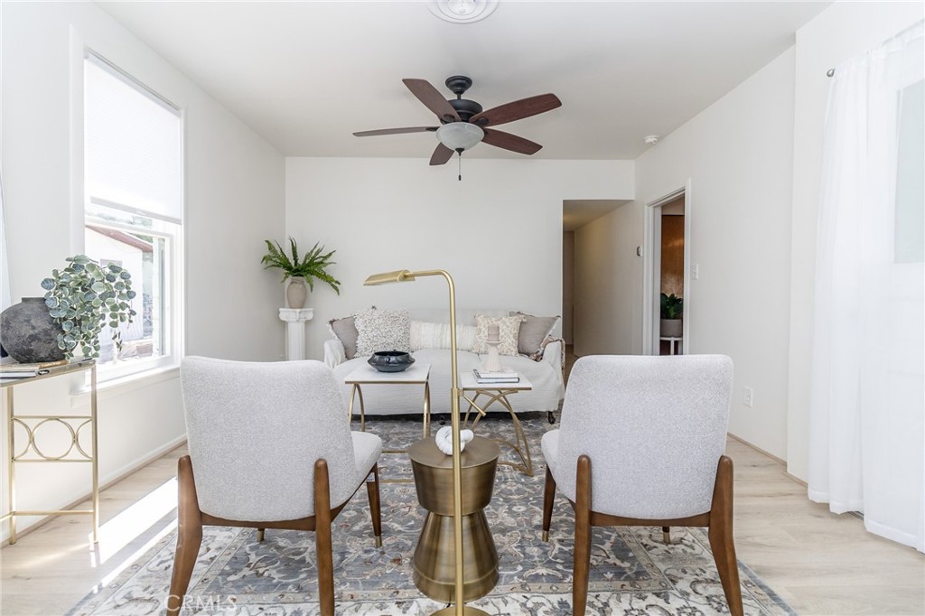 411 Bazoobuth Street Needles, CA 92363 - Photo 25 of 71 a view of a dining room with furniture and window