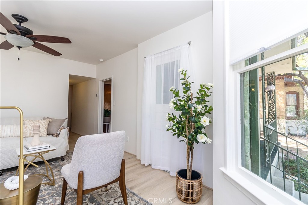 411 Bazoobuth Street Needles, CA 92363 - Photo 26 of 71 a view of a flower pot and a table in a room