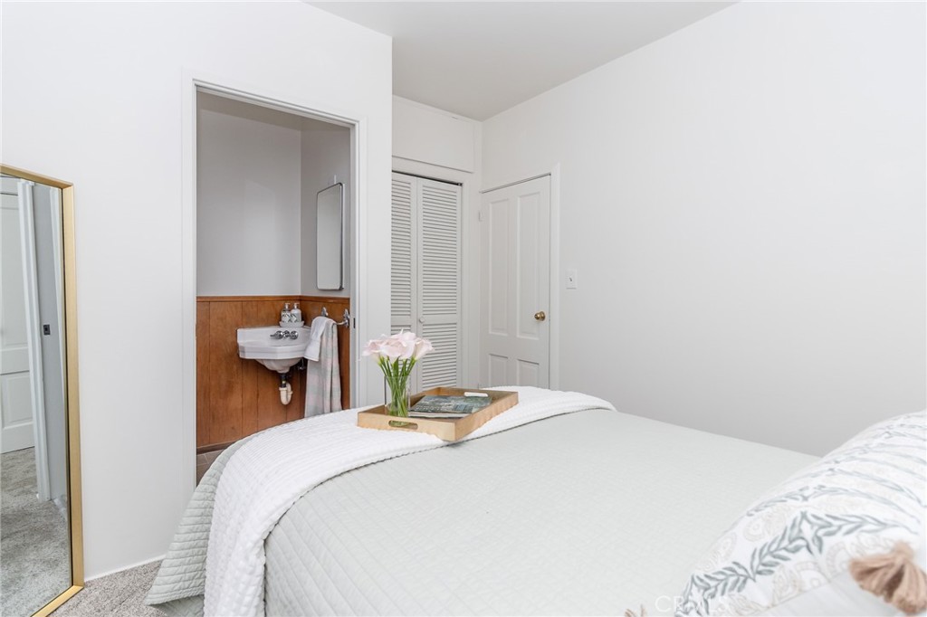 411 Bazoobuth Street Needles, CA 92363 - Photo 29 of 71 a bedroom with a bed and a closet