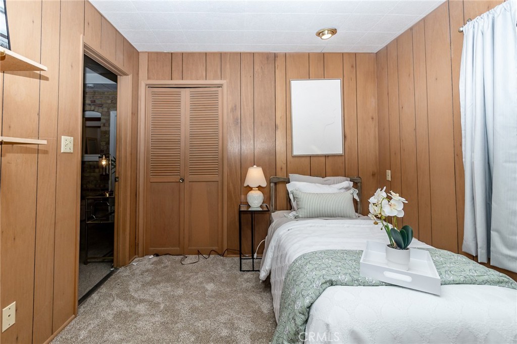 411 Bazoobuth Street Needles, CA 92363 - Photo 36 of 71 a bed room with a bed and a window