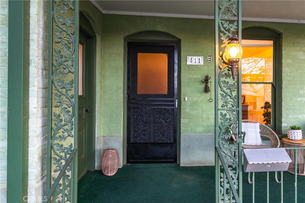 411 Bazoobuth Street Needles, CA 92363 - Photo 4 of 71 a front view of a house with a yard