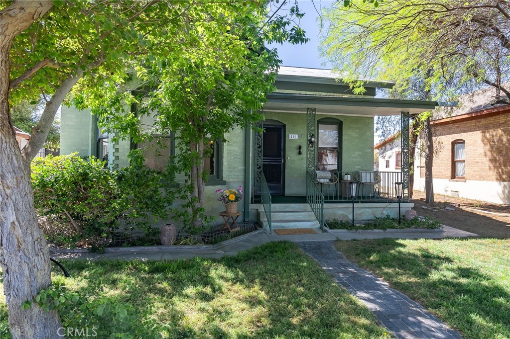 411 Bazoobuth Street Needles, CA 92363 - Photo 5 of 71 a view of a house with a yard
