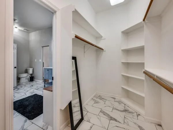 a bathroom with a sink and a shower