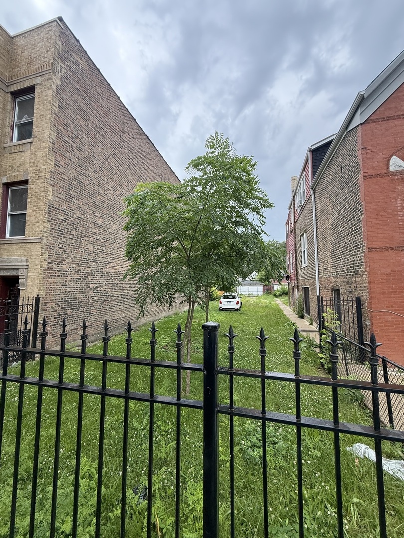 828 North Springfield Avenue Chicago, IL 60651 - Photo 1 of 1 a view of a fence
