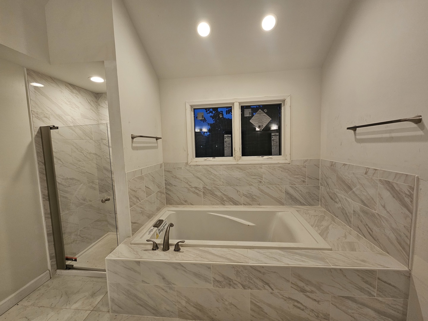 30 Danada Drive Wheaton, IL 60189 - Photo 4 of 28 a bathroom with a bathtub and a shower