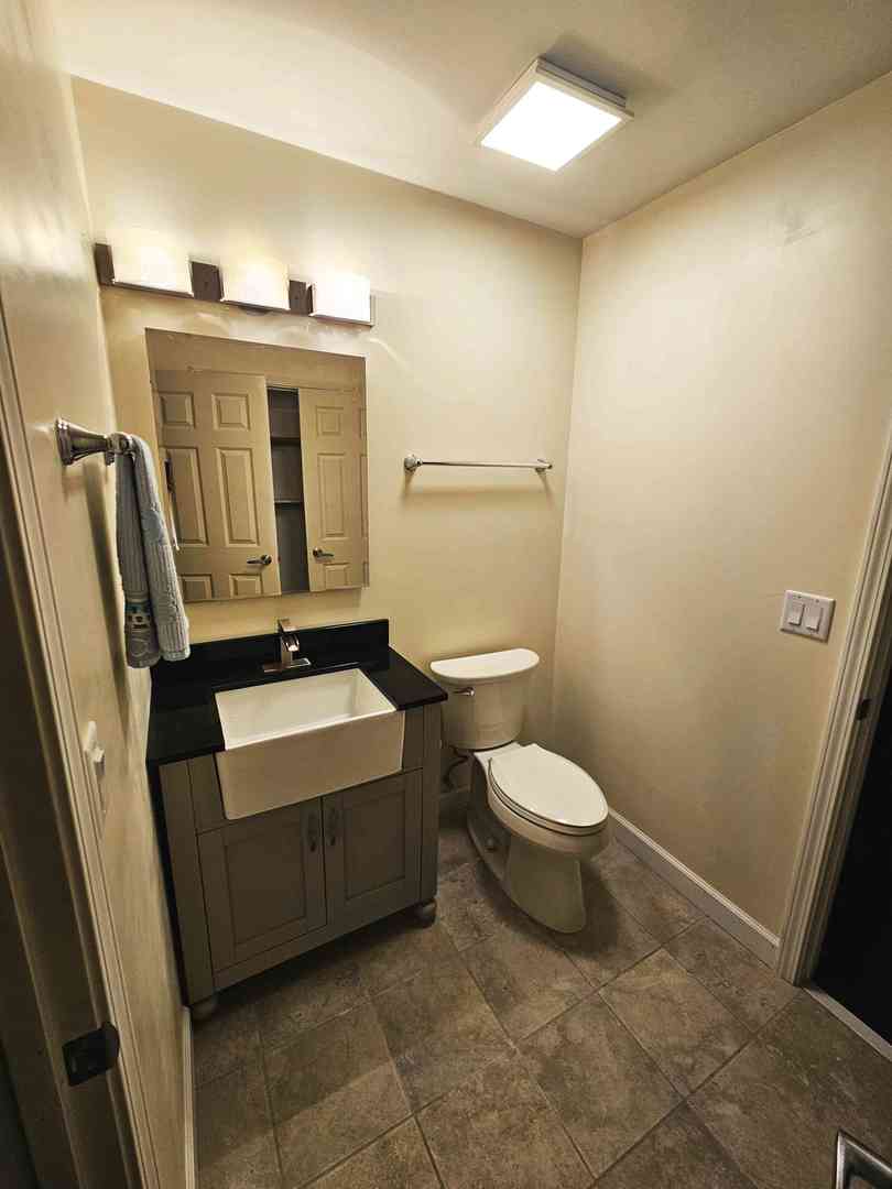 30 Danada Drive Wheaton, IL 60189 - Photo 7 of 28 a bathroom with a sink and a mirror