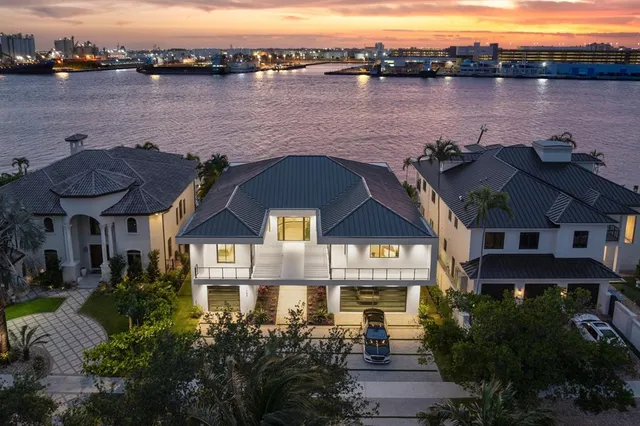 a front view of a house with lake view