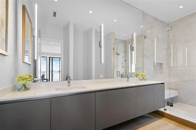 a view of room with staircase and large windows