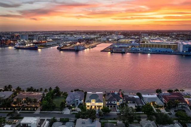 an aerial view of a city with lake view