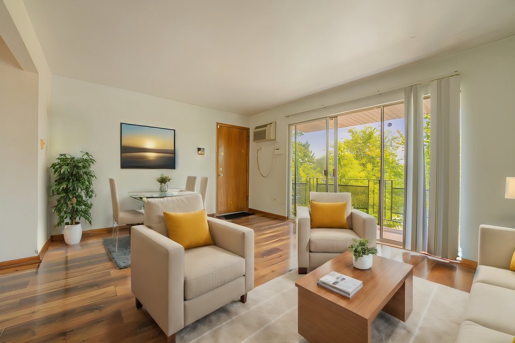 3756 West 120th Street, Unit 3A Alsip, IL 60803 - Photo 2 of 27 a living room with furniture and a flat screen tv