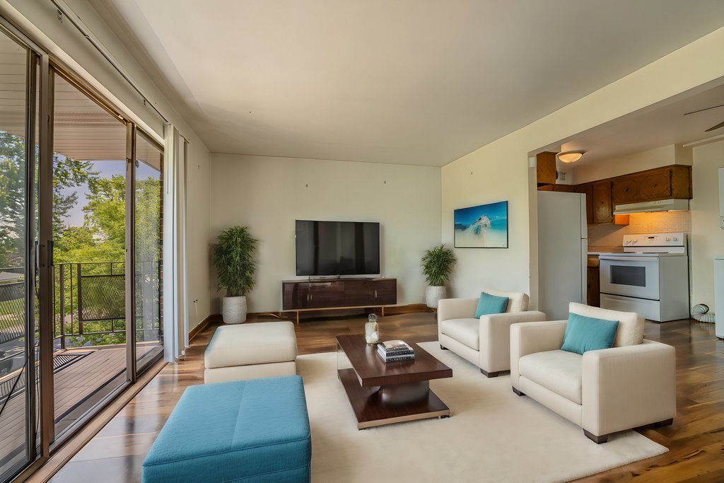 3756 West 120th Street, Unit 3A Alsip, IL 60803 - Photo 3 of 27 a living room with furniture wooden floor and a flat screen tv