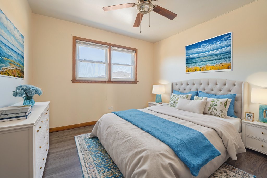 3756 West 120th Street, Unit 3A Alsip, IL 60803 - Photo 6 of 27 a bedroom with a bed and a chandelier