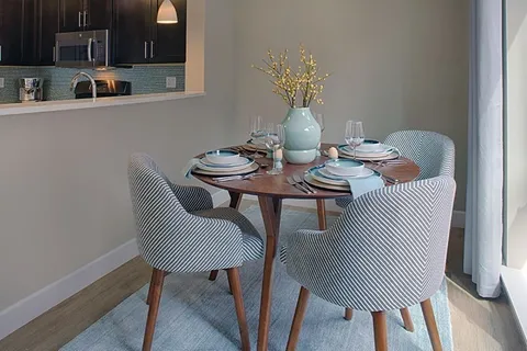 a view of a dining room with furniture