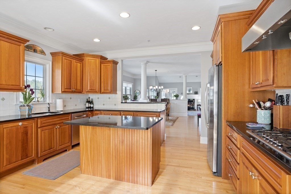 31 Sauta Farm Way, Unit 16 Hudson, MA 01749 - Photo 14 of 41 a kitchen with a sink appliances cabinets and a counter top space