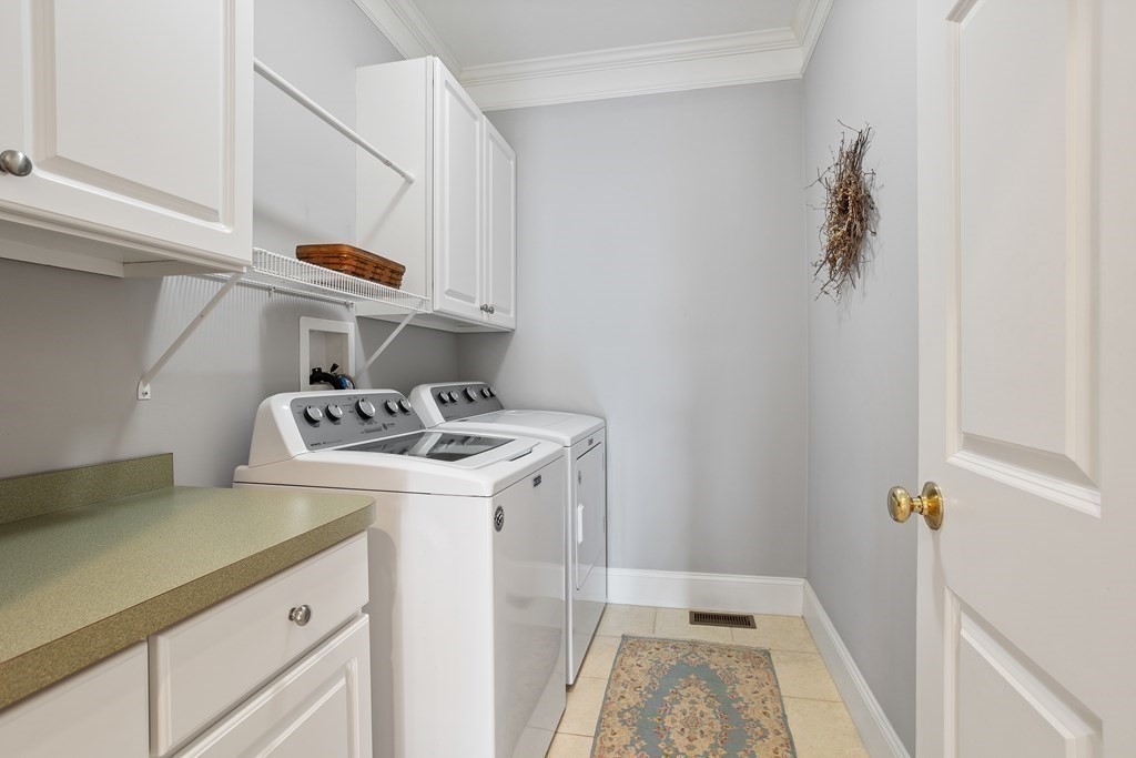 31 Sauta Farm Way, Unit 16 Hudson, MA 01749 - Photo 16 of 41 a utility room with dryer and washer