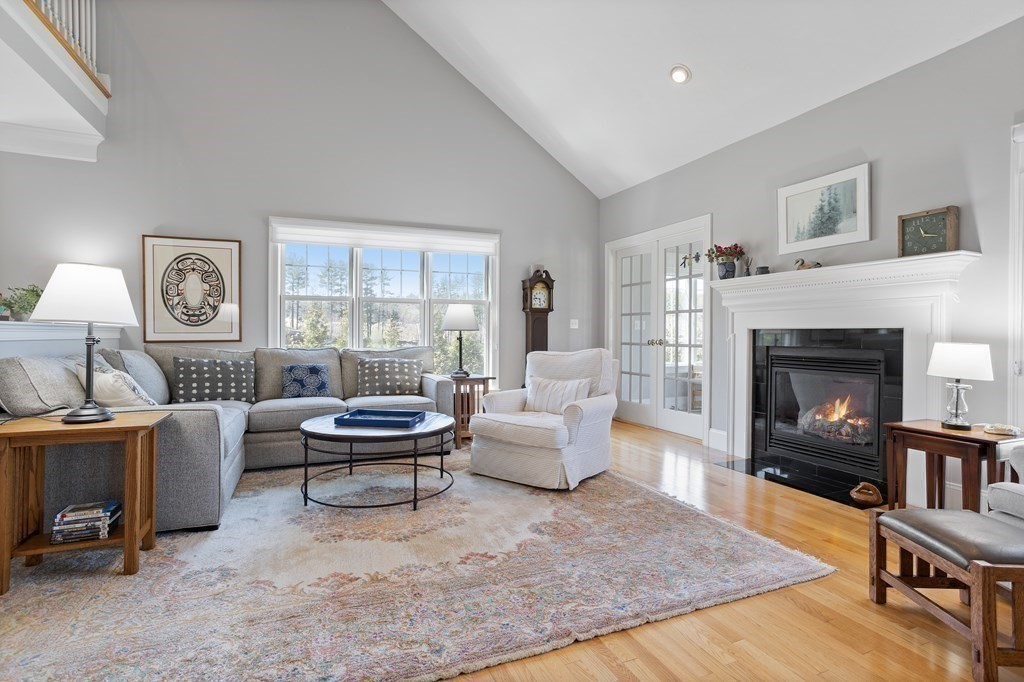31 Sauta Farm Way, Unit 16 Hudson, MA 01749 - Photo 20 of 41 a living room with furniture and a fireplace
