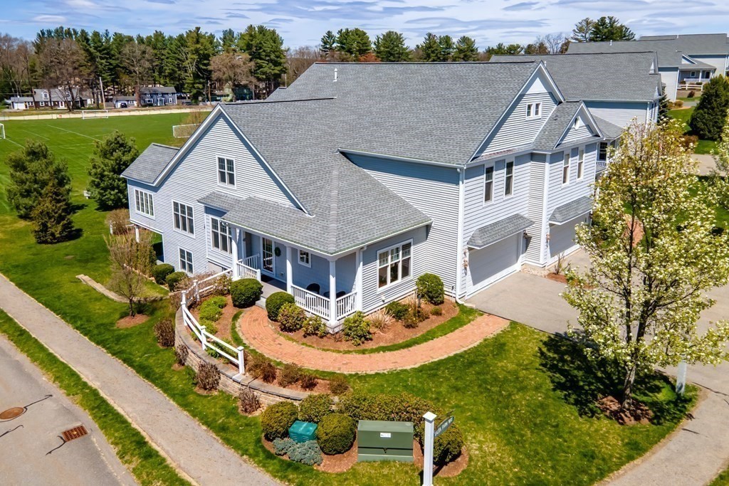 31 Sauta Farm Way, Unit 16 Hudson, MA 01749 - Photo 2 of 41 an aerial view of a house with a garden and plants