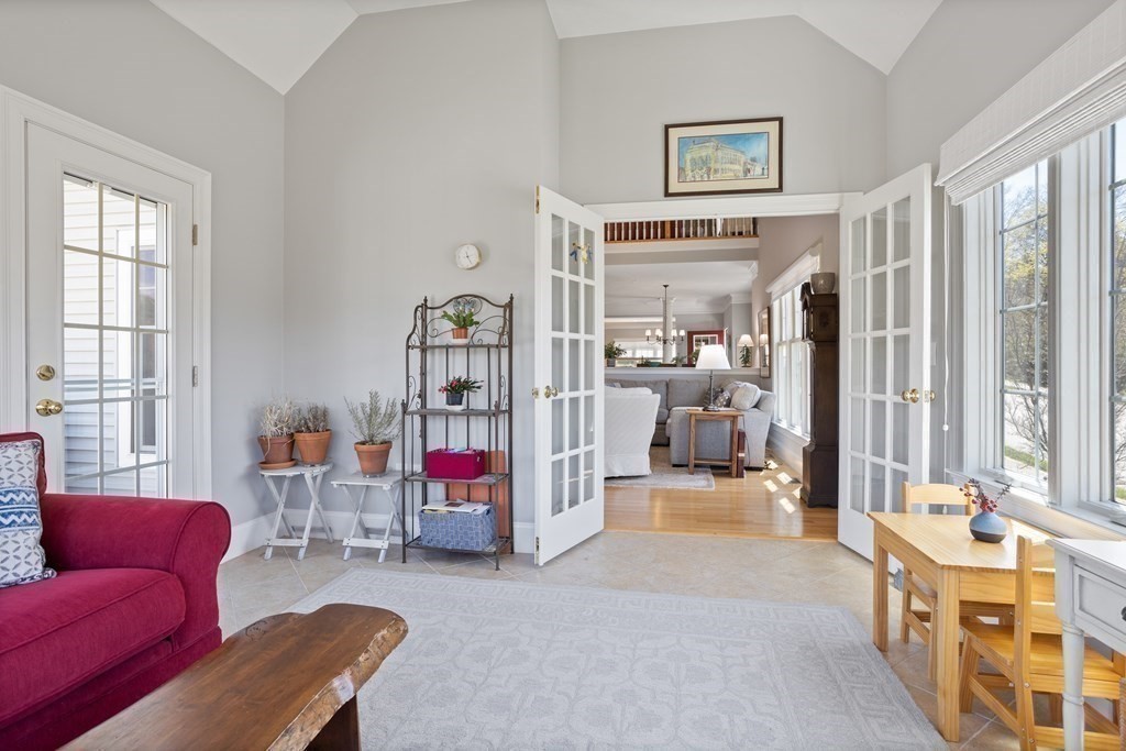 31 Sauta Farm Way, Unit 16 Hudson, MA 01749 - Photo 21 of 41 a living room with furniture and a large window