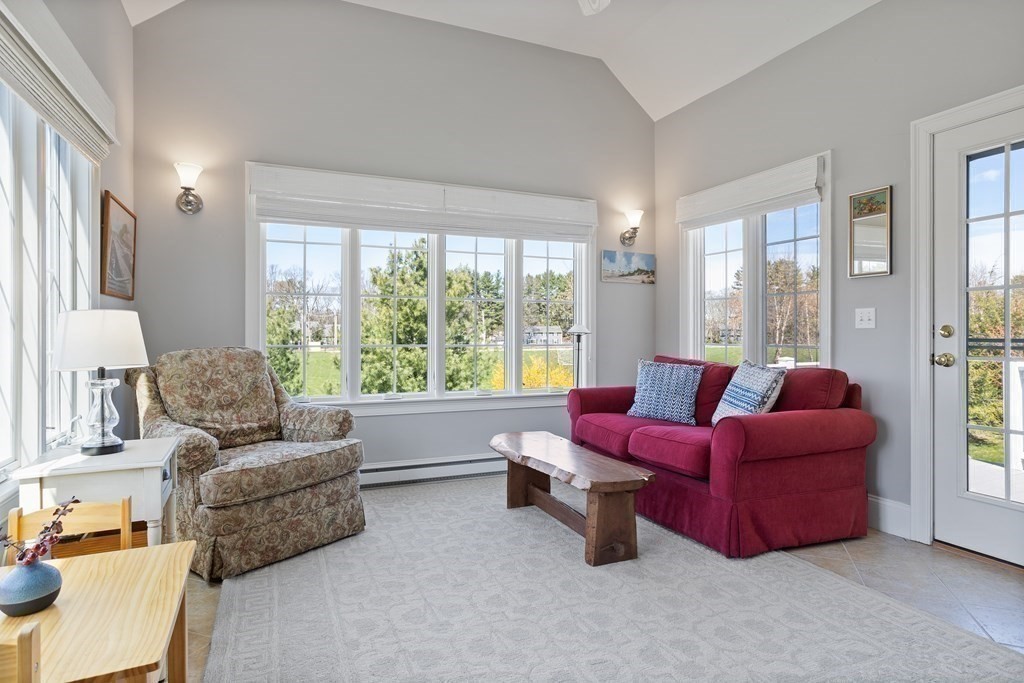 31 Sauta Farm Way, Unit 16 Hudson, MA 01749 - Photo 22 of 41 a living room with furniture and a large window