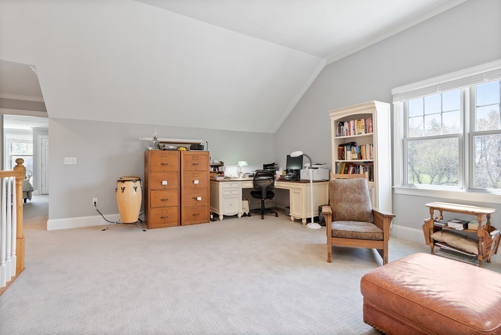 31 Sauta Farm Way, Unit 16 Hudson, MA 01749 - Photo 32 of 41 a bedroom with furniture and a large window