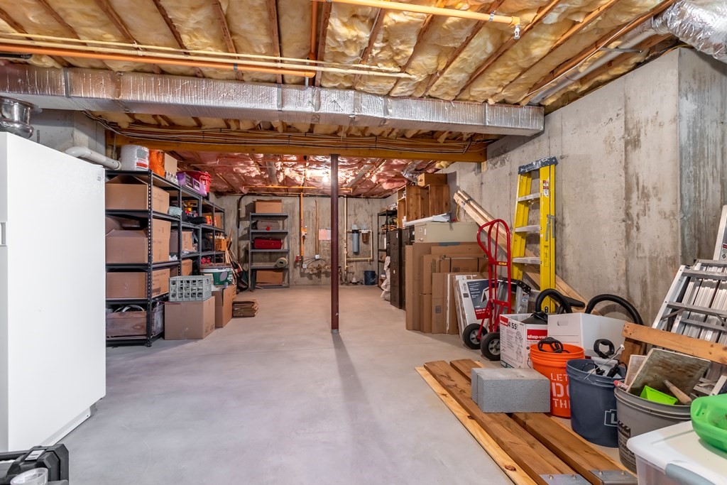 31 Sauta Farm Way, Unit 16 Hudson, MA 01749 - Photo 38 of 41 a view of storage and utility room
