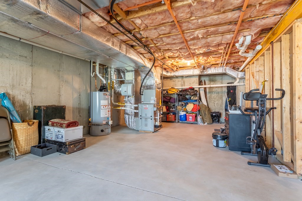 31 Sauta Farm Way, Unit 16 Hudson, MA 01749 - Photo 39 of 41 a view of a storage room with a lot of stuff