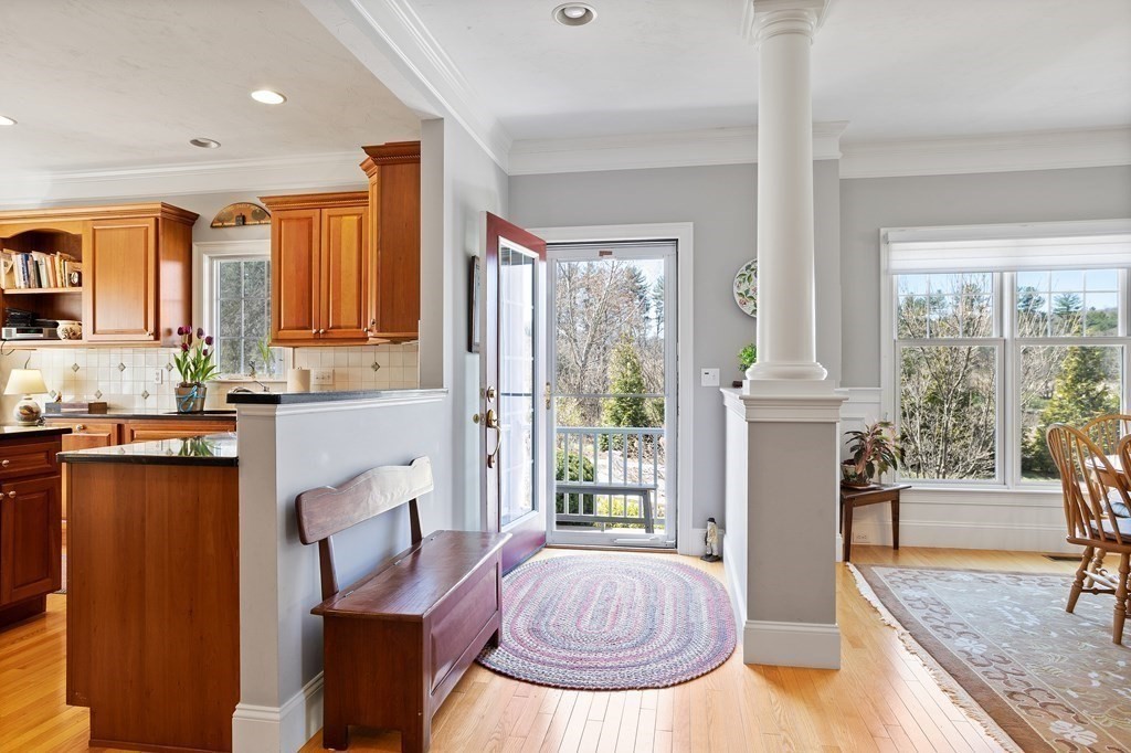 31 Sauta Farm Way, Unit 16 Hudson, MA 01749 - Photo 8 of 41 a living room filled with furniture windows