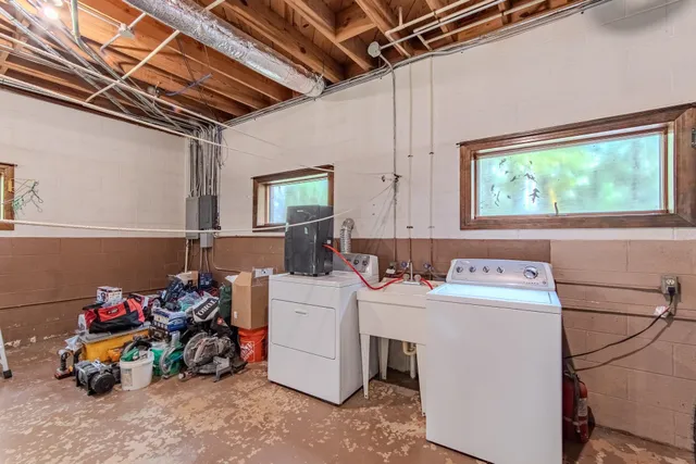 a utility room with dryer and washer