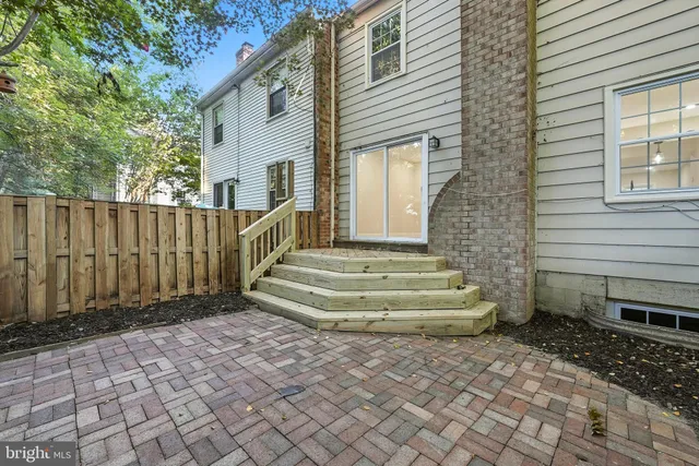 a bathroom with a sink toilet and mirror