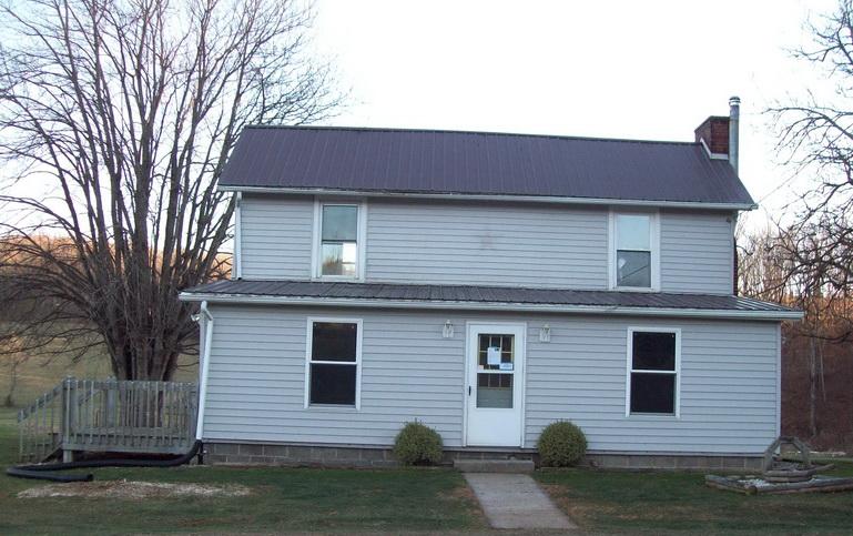 1142 Canning Factory Road Southwest Floyd, VA 24091 - Photo 1 of 17 a front view of a house with a yard