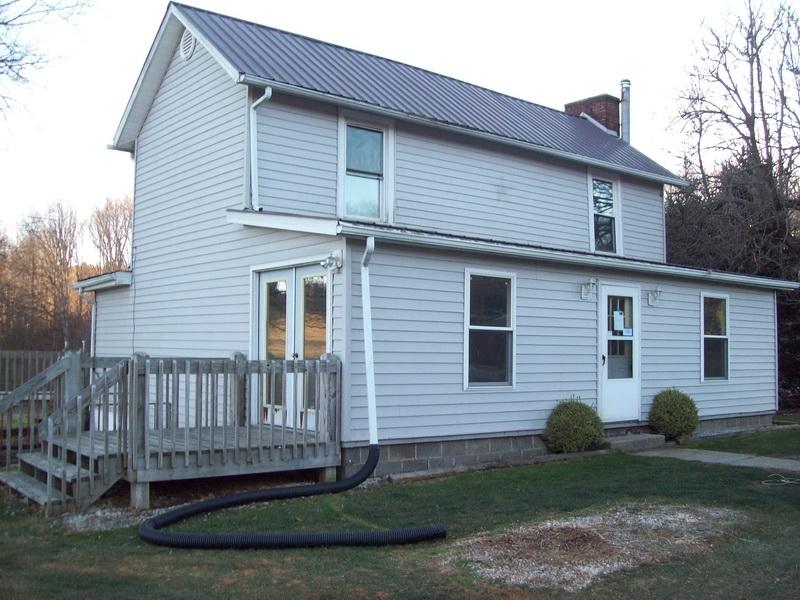 1142 Canning Factory Road Southwest Floyd, VA 24091 - Photo 12 of 17 a view of a house with a yard