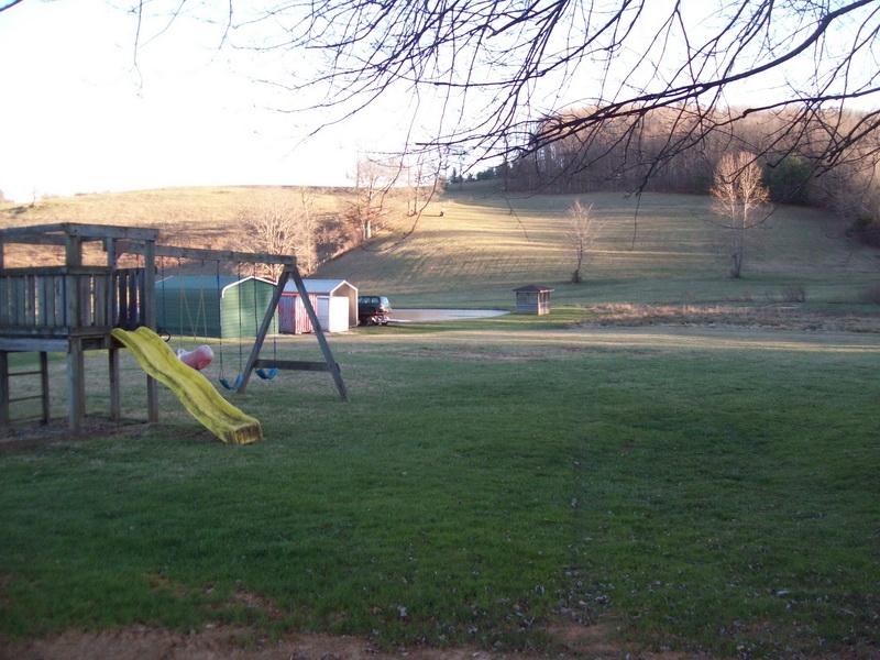 1142 Canning Factory Road Southwest Floyd, VA 24091 - Photo 14 of 17 a view of outdoor space with playground and green space