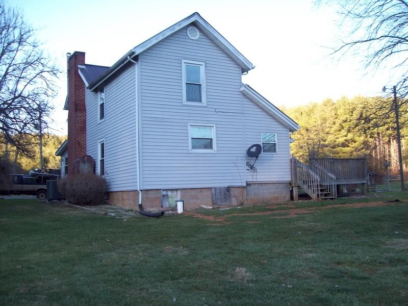 1142 Canning Factory Road Southwest Floyd, VA 24091 - Photo 16 of 17 a view of a house with backyard