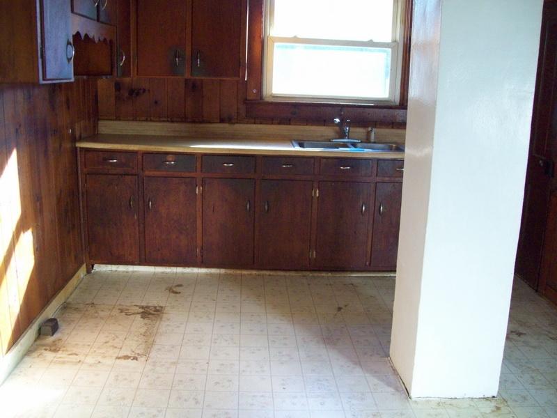 1142 Canning Factory Road Southwest Floyd, VA 24091 - Photo 6 of 17 a kitchen with a sink and cabinets
