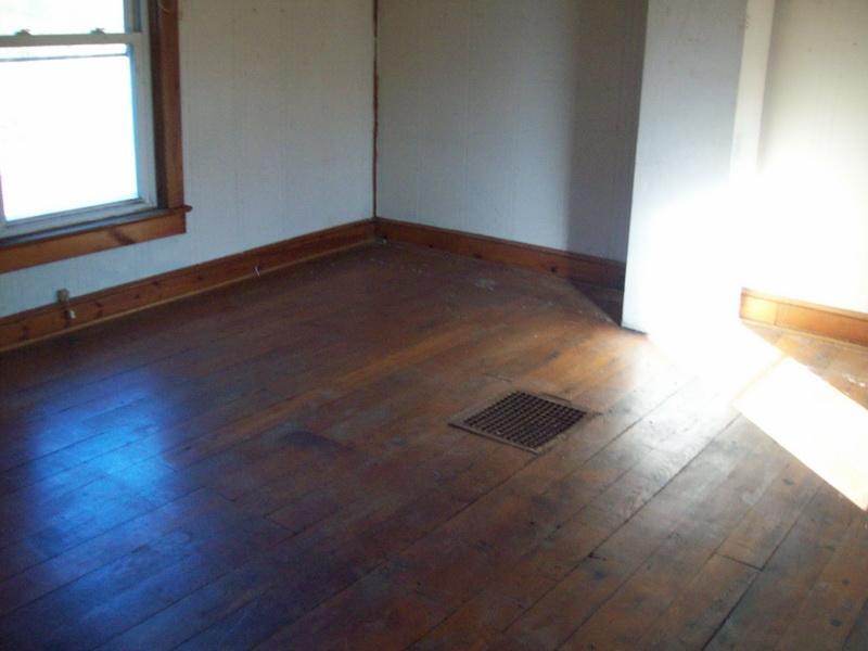 1142 Canning Factory Road Southwest Floyd, VA 24091 - Photo 7 of 17 a view of a room with wooden floor and window