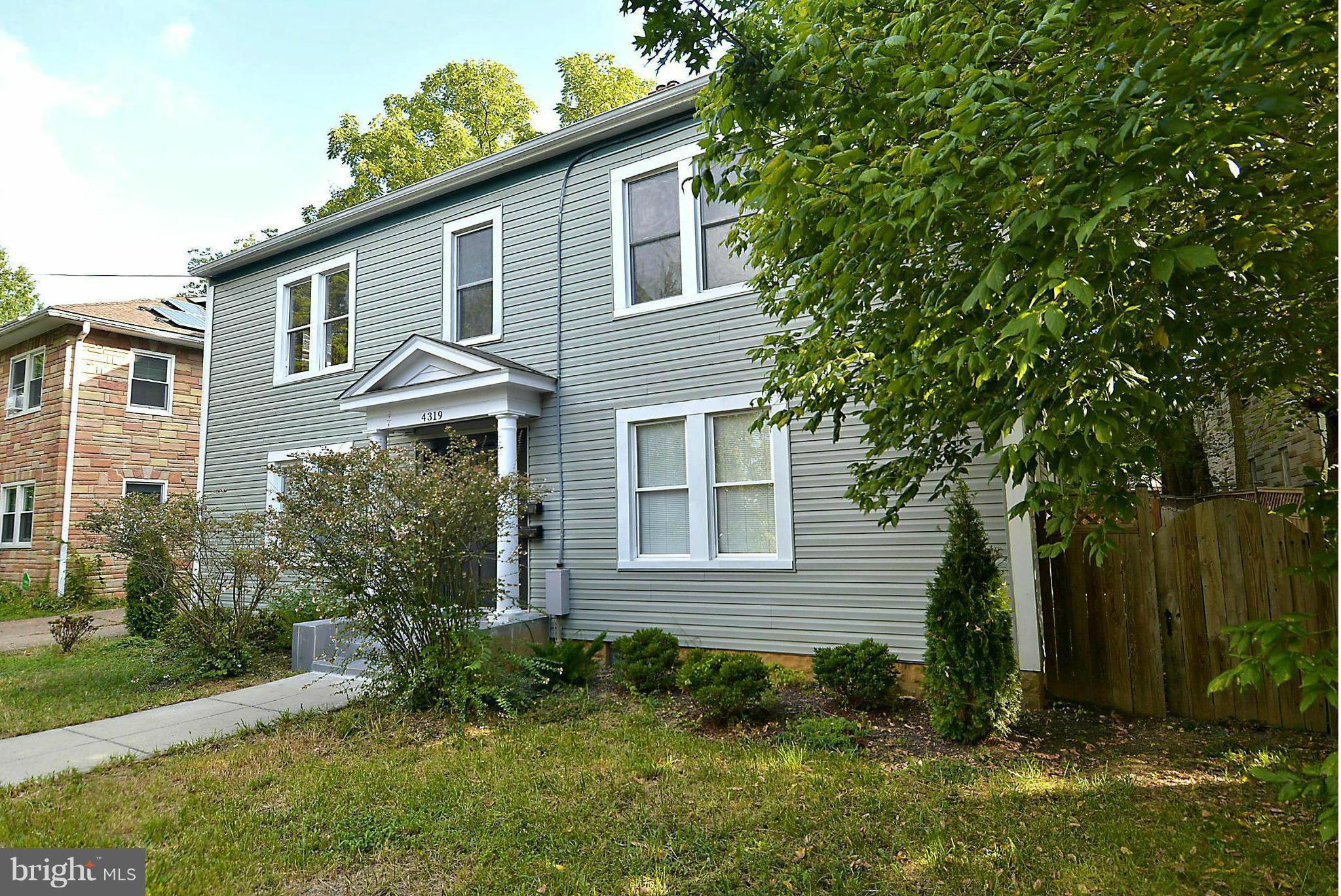 4319 River Road Northwest Washington, DC 20016 - Photo 3 of 22 a view of a house with a yard