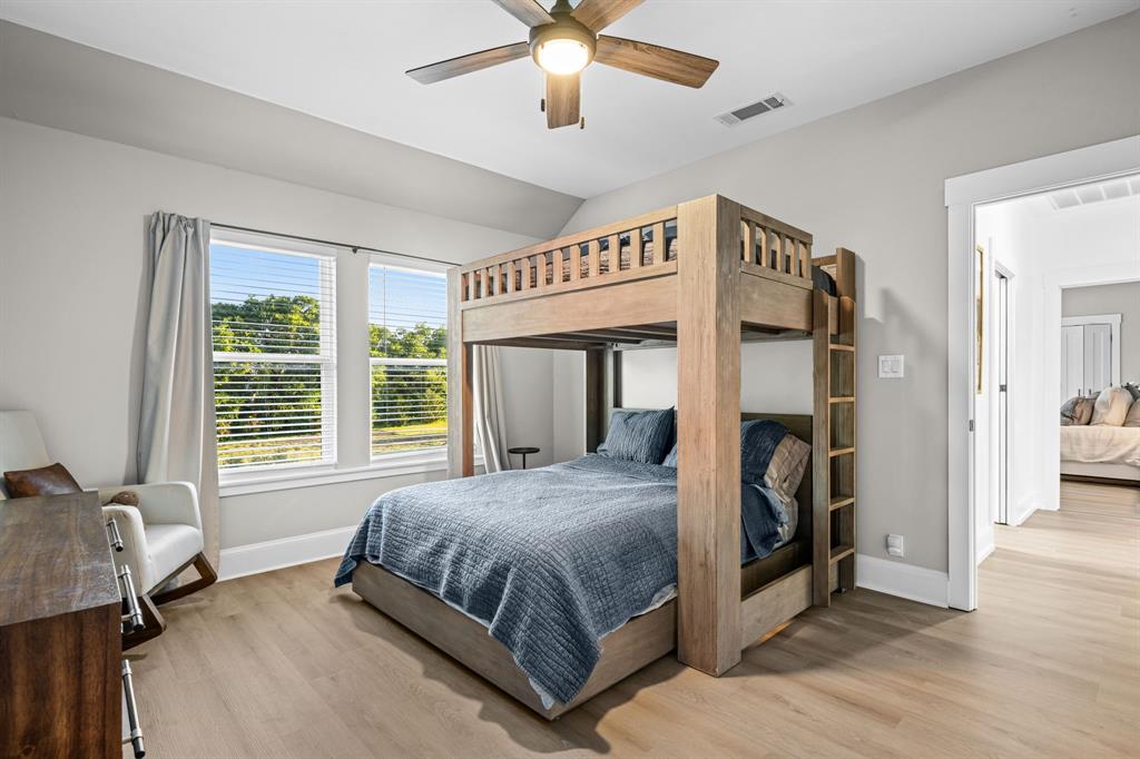 533 Camp Creek Road Rockwall, TX 75087 - Photo 25 of 38 Spacious bedroom featuring a ceiling fan