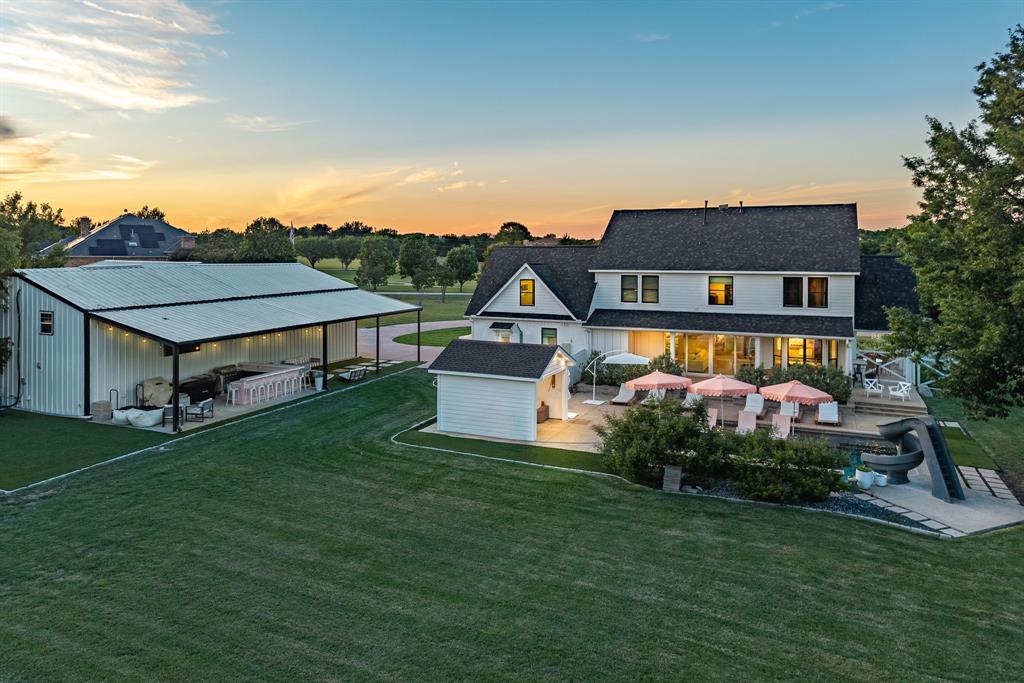 533 Camp Creek Road Rockwall, TX 75087 - Photo 3 of 38 An entertainers paradise - covered bar and seating, pool front cabana and a sparkling pool.