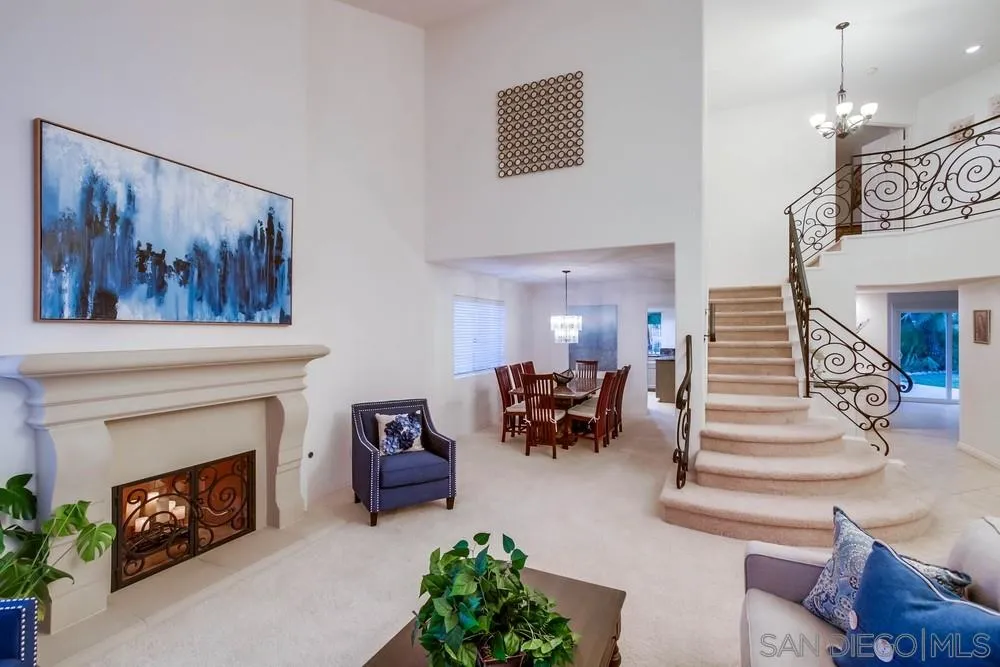 13952 Carriage Road Poway, CA 92064 - Photo 11 of 49 a living room with furniture and a fireplace