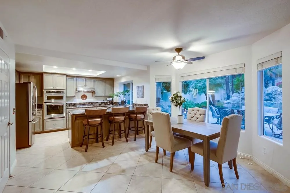 13952 Carriage Road Poway, CA 92064 - Photo 20 of 49 a view of a dining room with furniture window and outside view