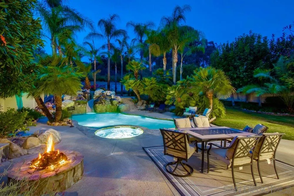13952 Carriage Road Poway, CA 92064 - Photo 3 of 49 a view of a chairs and table in a backyard