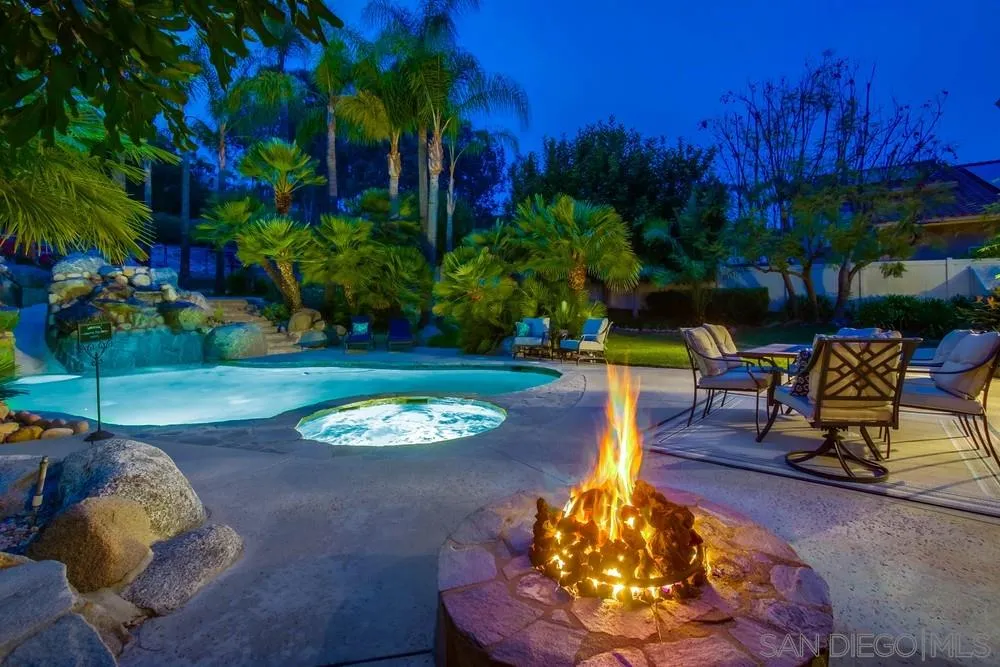 13952 Carriage Road Poway, CA 92064 - Photo 4 of 49 a swimming pool with barbeque oven outdoor seating