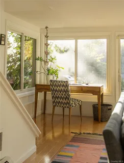 a view of a room with a large window