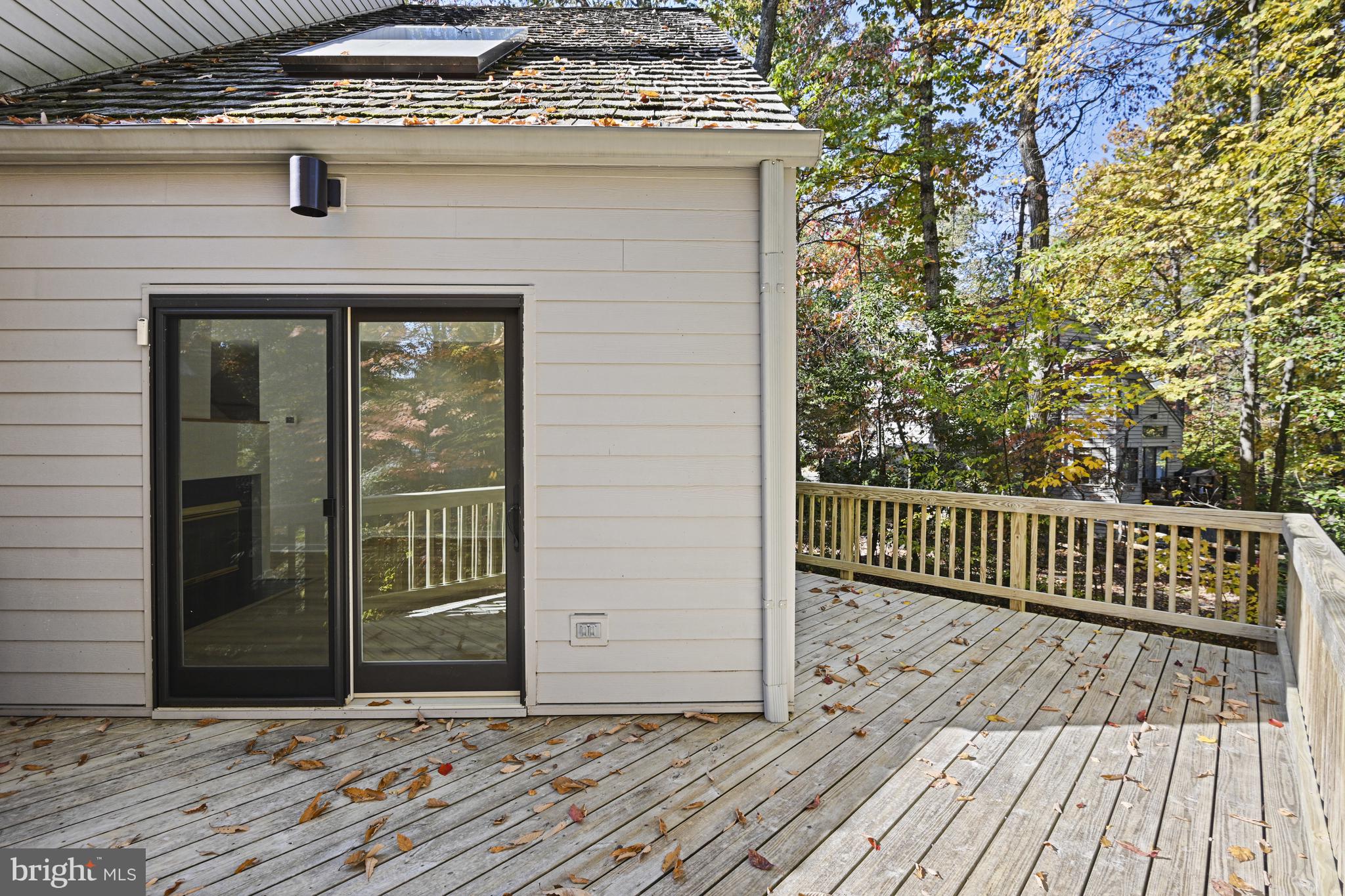 11504 Turnbridge Lane Reston, VA 20194 - Photo 16 of 51 a view of a wooden deck besides a house
