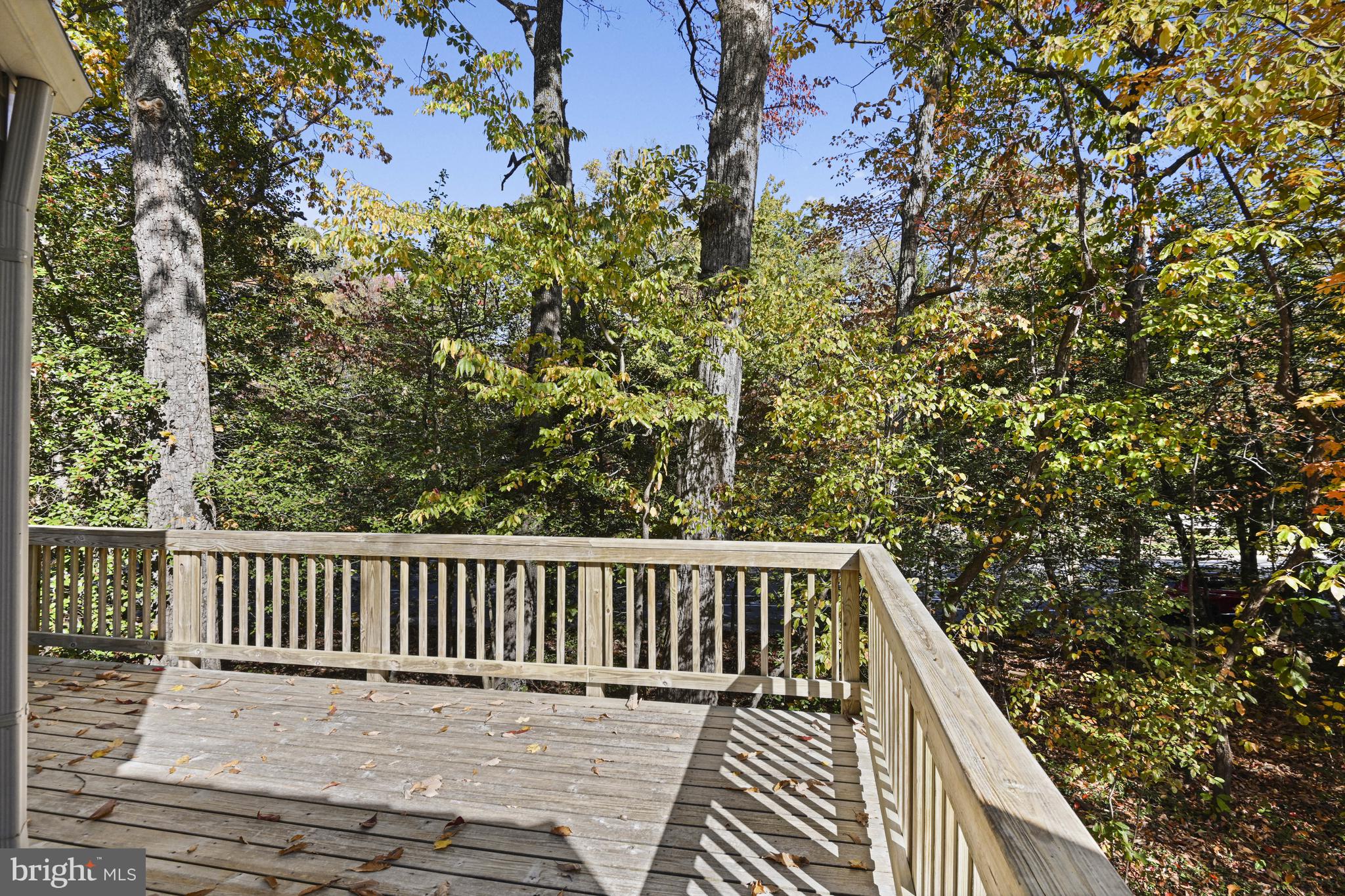 11504 Turnbridge Lane Reston, VA 20194 - Photo 19 of 51 a balcony with wooden floor and fence