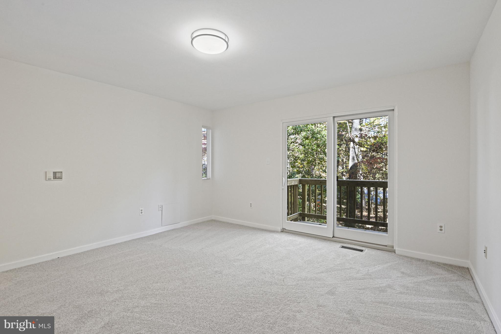11504 Turnbridge Lane Reston, VA 20194 - Photo 25 of 51 an empty room with windows