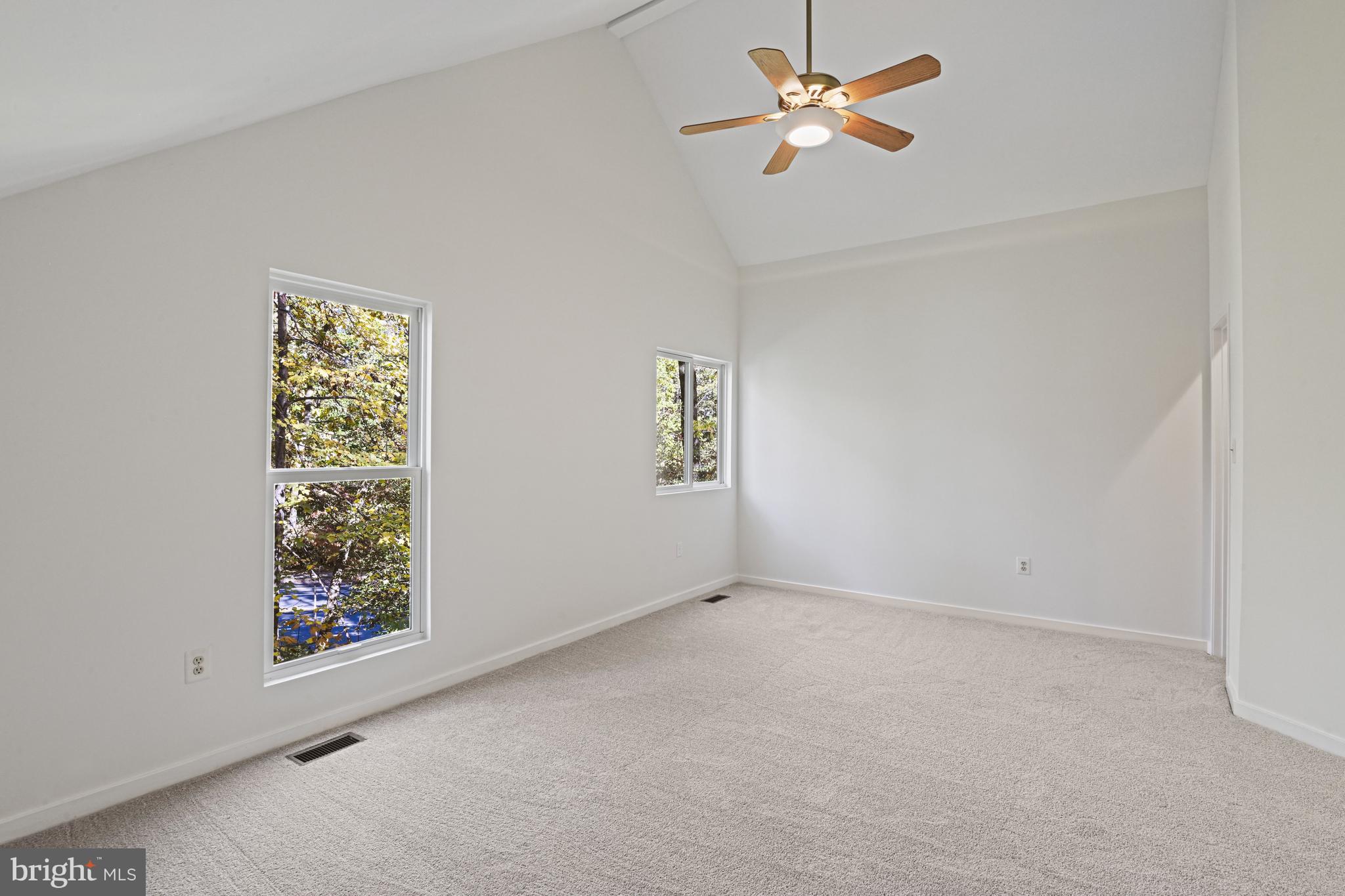 11504 Turnbridge Lane Reston, VA 20194 - Photo 33 of 51 an empty room with windows and fan